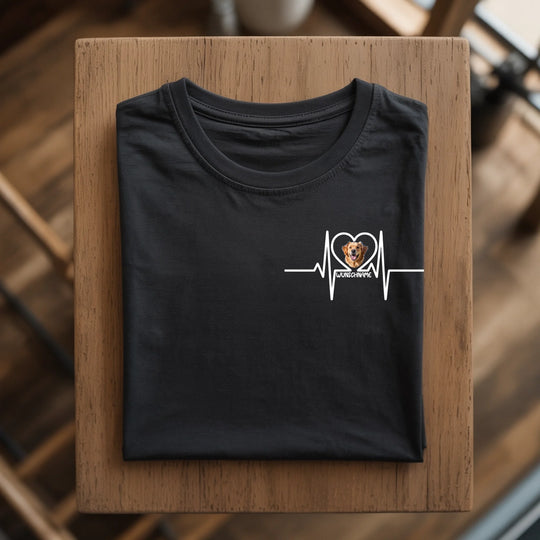 a-photograph-of-a-neatly-folded-black-t-_NyHzoYs5SD6ZYhox8WWe7A_7B8Tk7e-RiC_MnaYIxlPsw